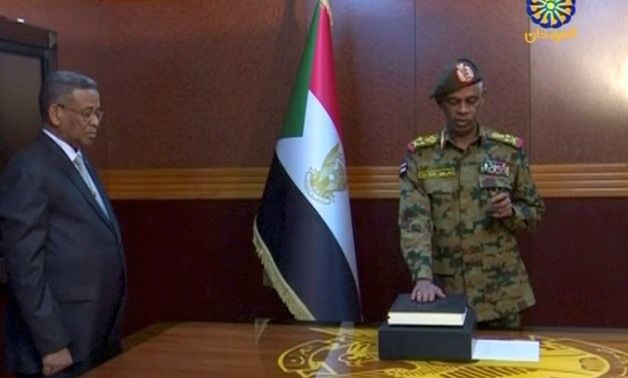Sudan's Defence Minister Awad Mohamed Ahmed Ibn Auf is sworn in as a head of Military Transitional Council in Sudan in this still image taken from video on April 11, 2019. Sudan TV/ReutersTV via REUTERS