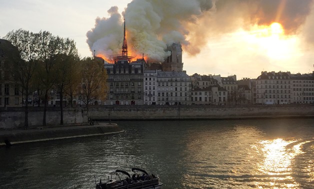 Smoke billows from the Notre Dame Cathedral after a fire broke out, in Paris, France, April 15, 2019. REUTERS/Julie Carriat TPX IMAGES OF THE DAY
