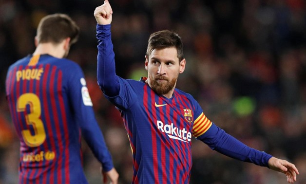 January 13, 2019 Barcelona's Lionel Messi celebrates scoring their second goal with Gerard Pique REUTERS/Albert Gea
