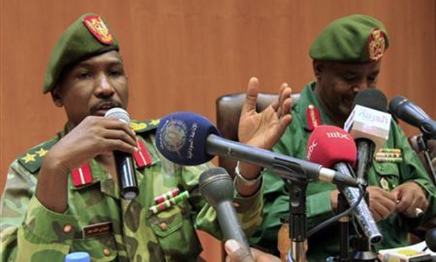 Northern military spokesman Al-Sawarmi Khaled (L) speaks during a joint news conference with Deputy of Sudanese Army Intelligence Sideque Amer Hassan in Khartoum May 20, 2011. REUTERS/Mohamed Nureldin Abdallah


