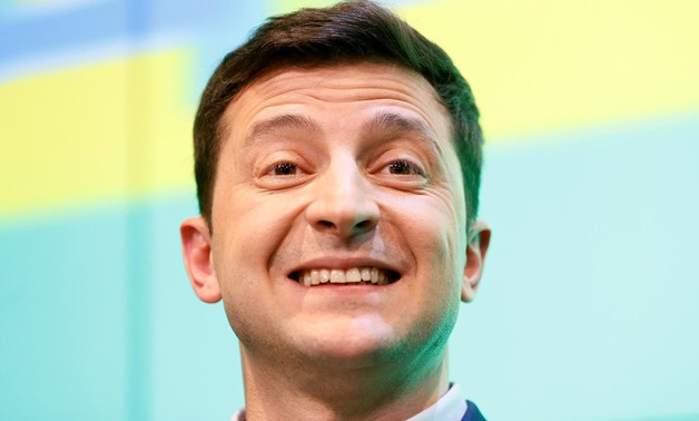 Ukrainian presidential candidate Volodymyr Zelenskiy reacts following the announcement of the first exit poll in a presidential election at his campaign headquarters in Kiev, Ukraine April 21, 2019. REUTERS/Stringer
4/PRIVATBANK PROBLEMS