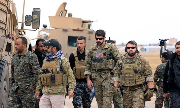 Washington said earlier this month it would leave about 400 US troops split between two different regions of Syria [File: Rodi Said/Reuters]