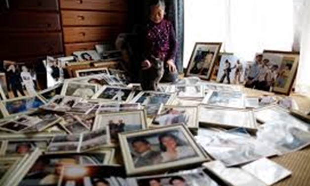 Royal aficionado Fumiko Shirataki, 78, displays her collection of photographs of royal family members at her home in Kawasaki, Japan, February 21, 2019. REUTERS/Issei Kato
