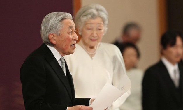 Japan's Emperor Akihito, flanked by Empress Michiko, delivers a speech during a ritual called Taiirei-Seiden-no-gi, a ceremony for the Emperor's abdication, at the Imperial Palace in Tokyo, Japan April 30, 2019. Japan Pool/Pool via REUTERS JAPAN OUT. NO R