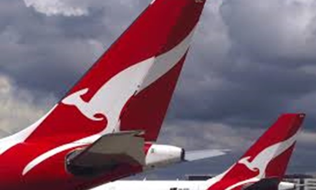 FILE PHOTO: Two Qantas Airways Airbus A330 aircraft can be seen on the tarmac near the domestic terminal at Sydney Airport in Australia, November 30, 2017. REUTERS/David Gray
