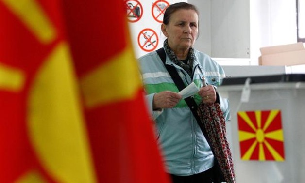 Voting in a run-off for a new president in North Macedonia began on Sunday, in an election that has been dominated by divisions over a change in the country's name to mollify Greece and open the way for membership of NATO and the European Union.

