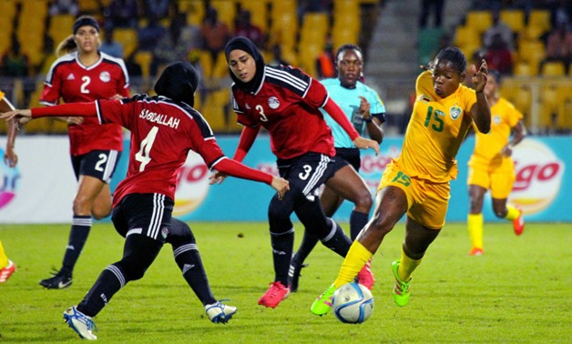 FILE- Egyptian female football players 