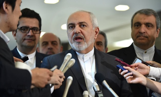 Kazuhiro NOGI, AFP | Iranian Foreign Minister Mohammad Javad Zarif (C) answers questions after a meeting with Japanese Foreign Minister Taro Kono in Tokyo on May 16, 2019.