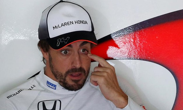 Formula One - Spanish Grand Prix - Barcelona-Catalunya racetrack, Montmelo, Spain - 13/5/16 McLaren's F1 driver Fernando Alonso attends the first free practice. REUTERS/Juan Medina
