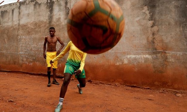 When Gaelle Asheri first started playing soccer in the dirt streets near her home in Cameroon's capital, she was the only girl on the informal neighborhood teams which used stones for goal posts and kept score by chalking results on a wall.

