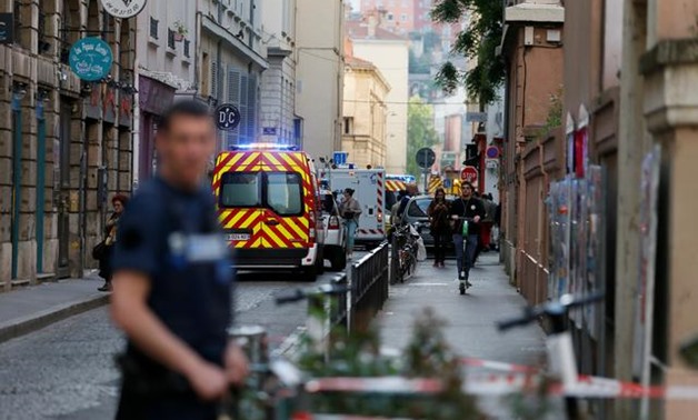 French police hunt suitcase bomber after blast in Lyon - Reuters