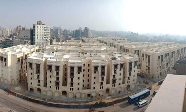FILE - Rawdat al-Sayeda housing units 