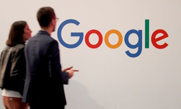 FILE PHOTO: Visitors pass by the logo of Google at the high profile startups and high tech leaders gathering, Viva Tech,in Paris, France May 16, 2019. REUTERS/Charles Platiau/File Photo
