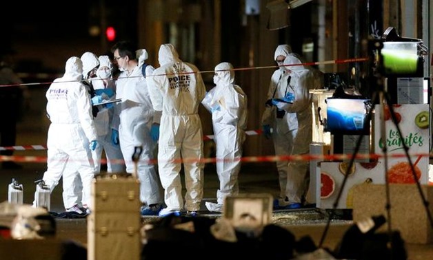 FILE PHOTO: Forensic officers inspect the site of a suspected bomb attack in central Lyon

