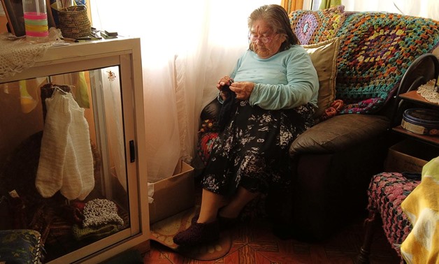 The last woman from a tribe Yagan and speaker of this language, Cristina Calderon, 91, takes part in an interview with Reuters at her house in Ukika village, Puerto Williams, Chile May 17, 2019. REUTERS/Jorge Vega
