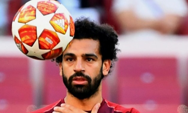 Liverpool forward Mohamed Salah will hope to banish memories of last year's final when he came off injured and in tears AFP
