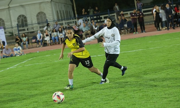 Egyptian female athletes playing a final match in the first Ramadan championship for women’s football last month at the Gezira Youth Center - Nabil Sedky/US Embassy in Cairo
