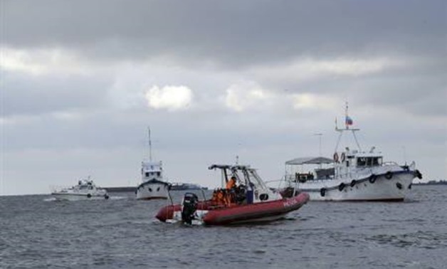 Russian Emergencies Ministry members take part in the operation to search for the missing people from the tourist boat "Bulgaria" on the Volga river in Russia's Tatarstan region July 11, 2011. REUTERS/Russian Emergencies Ministry/Handout
