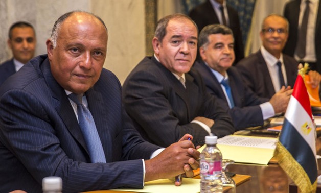 Egyptian Foreign Minister Sameh Shoukry, left, and his Algerian counterpart Sabri Boukadoum, 2nd left, attend a meeting in Tunis, Tunisia, Wednesday, June 12, 2019. (AP)
