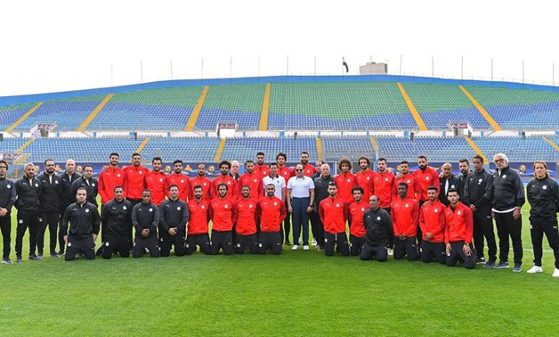 President Abdel Fatah al-Sisi and members of the National Football Team pose for a group photo at the Air Defense Stadium in Cairo, Egypt. June 15, 2019. Press Photo 