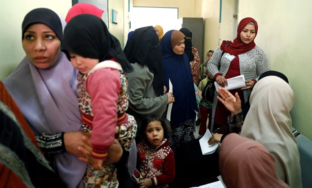 A family planning adviser speaks with Egyptian mothers at a new clinic in the province of Fayoum, southwest of Cairo, Egypt February 19, 2019. Picture taken February 19, 2019. REUTERS/Hayam Adel