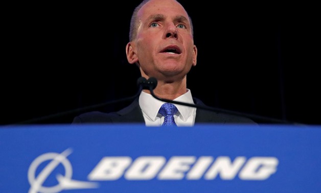 FILE PHOTO: Boeing Co Chief Executive Dennis Muilenburg speaks during a news conference at the annual shareholder meeting in Chicago, Illinois, U.S., April 29, 2019. Jim Young/Pool via REUTERS
