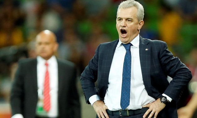 FILE PHOTO: Japan's coach Javier Aguirre (R) reacts in front of Jordan's coach Ray Wilkins during their Asian Cup Group D soccer match at the Rectangular stadium in Melbourne January 20, 2015. REUTERS/Brandon Malone/File Photo
