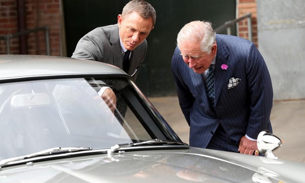 Britain's Prince Charles meets Daniel Craig as he tours the set of the 25th James Bond Film at Pinewood Studios in Iver Heath, Buckinghamshire, Britain June 20, 2019. Chris Jackson/Pool via REUTERS
