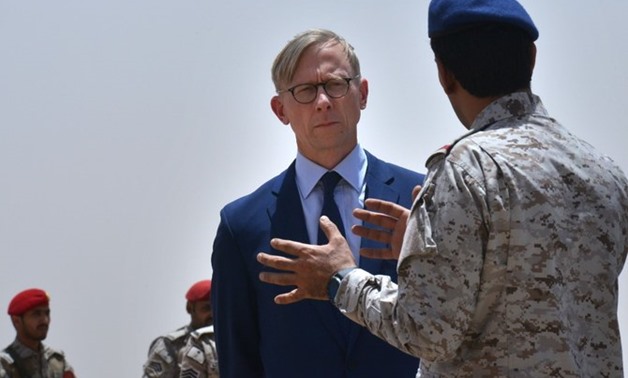 Brian Hook, left, the US special representative on Iran, listens to a member of the Saudi military forces at an army base in Al Kharj, south of the Saudi capital Riyadh, on June 21, 2019. (AFP)
