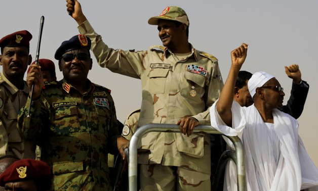 Lieutenant General Mohamed HamdanDagalo, deputy head of the military council and head of paramilitary Rapid Support Forces (RSF), greets his supporters as he arrives at a meeting in Aprag village, 60 kilometers away from Khartoum, Sudan, June 22, 2019. RE