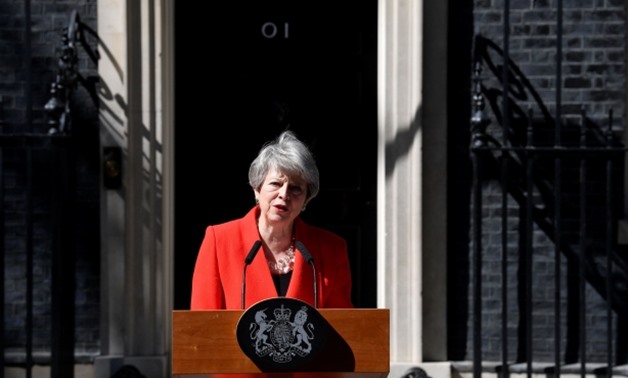 British Prime Minister Theresa May reacts as she delivers a statement in London, Britain - Reuters