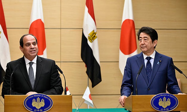 Egypt's President Abdel Fattah El-Sisi (R) attends with Japan's Prime Minister Shinzo Abe (L) agreements signings at Abe's official residence in Tokyo, Japan - Photo courtesy of the Egyptian Presidency