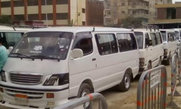 FILE - Mini buses parking in Station 