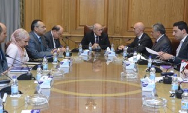Minister of Military Production Mohamed al-Assar (middle) and the managing director of Trayal Corporation and accompanying delegation (r) in a meeting in Cairo, Egypt. July 15, 2019. Press Photo 