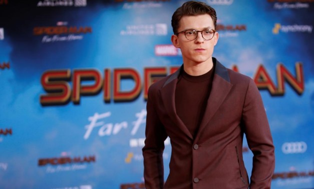 FILE PHOTO: Actor Tom Holland poses at the World Premiere of Marvel Studios' "Spider-man: Far From Home" in Los Angeles, California, U.S., June 26, 2019. REUTERS/Danny Moloshok/File Photo