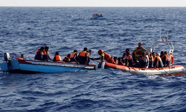 Migrants rescued from burning boat near Spanish coast photo credit Reuters 