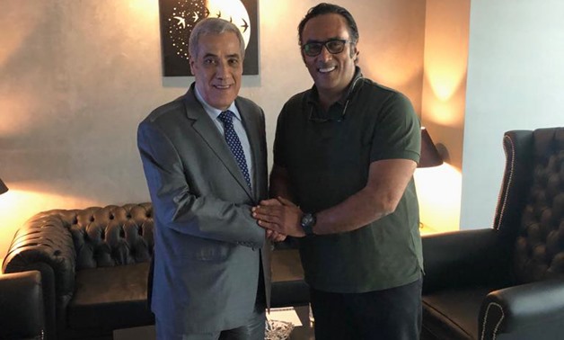 (L to R): Algerian Ambassador in Cairo Nazir Al Arabawy shaking hands with Chairman and Managing Director of Tazkarti Marketing services company, Montasser Al Nabarawy