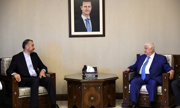 Hossein Amir Abdollahian, a special aide to the speaker of Iranian Parliament on international affairs, meets with Syria's Foreign Minister Walid Muallem in Damascus, Syria, on July 15, 2019. Abdollahian also met with Lebanese officials on July 17. (Reute