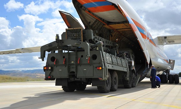 First parts of a Russian S-400 missile defense system are unloaded from a Russian plane at Murted Airport, known as Akinci Air Base, near Ankara, Turkey, July 12, 2019. Turkish Military/Turkish Defence Ministry/Handout via REUTERS