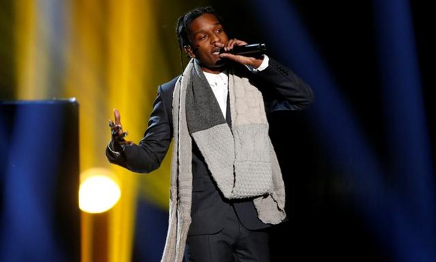 FILE PHOTO: A$AP Rocky performs "I'm Not the Only One" with Sam Smith (not pictured) during the 42nd American Music Awards in Los Angeles, California November 23, 2014. REUTERS/Mario Anzuoni/File Photo.
