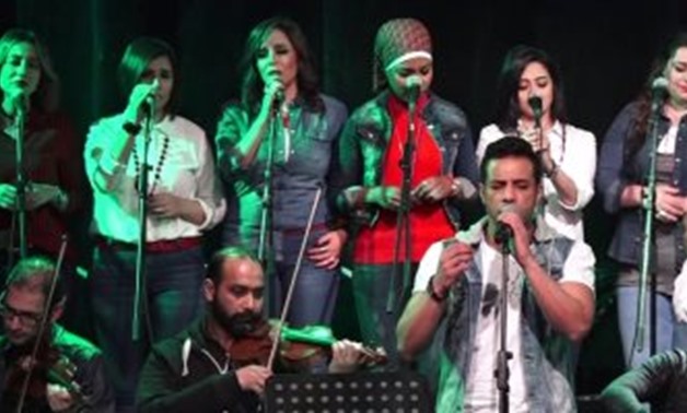 FILE - Ayamna el Helwa band