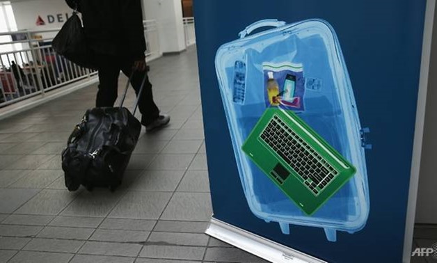 US aviation security will not be imposing a ban on carry-on computers on flights coming from Europe, for now - AFP
