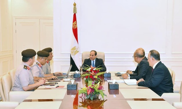 Sisi meets with chairman of the Armed Forces Engineering Authority Ihab el Far and a number of engineering directors - Press photo