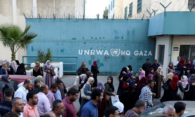 FILE PHOTO: Palestinian employees of United Nations Relief and Works Agency (UNRWA) take part in a protest against job cuts by UNRWA, in Gaza City September 19, 2018. REUTERS/Ibraheem Abu Mustafa//File Photo