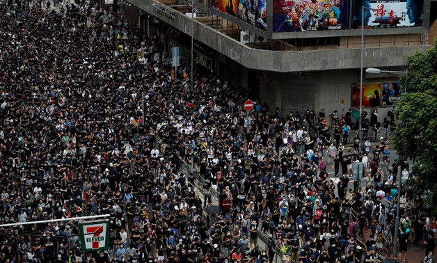 Anti-extradition bill protesters march at Mongkok, in Hong Kong, China, August 3, 2019. REUTERS/Tyrone Siu
