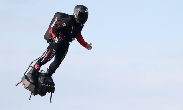 French inventor Franky Zapata takes off on a Flyboard for a second attempt to cross the English channel from Sangatte to Dover, in Sangatte, France, August 4, 2019. REUTERS/Yves Herman
