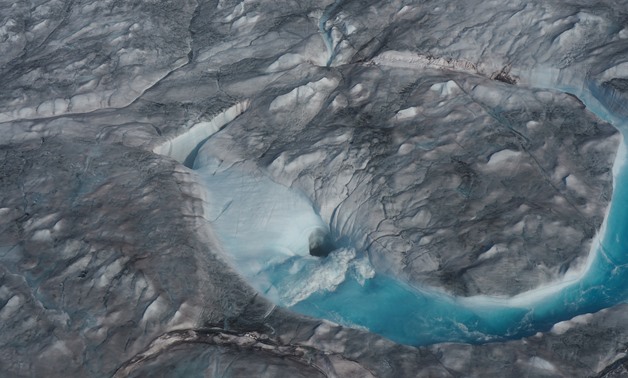 A view of ice melting during a heatwave in Kangerlussuaq, Greenland is seen in this August 1, 2019 image obtained via social media- Reuters.