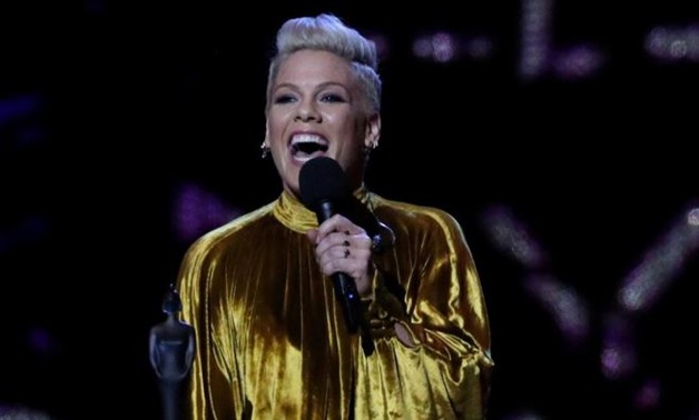 FILE PHOTO: Pink with the award for Outstanding Contribution at the Brit Awards at the O2 Arena in London, Britain, February 20, 2019. REUTERS/Hannah McKay/File Photo