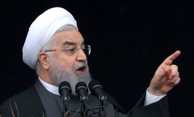Iranian president Hassan Rouhani delivers his speech during a ceremony marking the 40th anniversary of the 1979 Islamic Revolution, at the Azadi (Freedom) square in Tehran, Iran. Photograph: Abedin Taherkenareh/EPA

