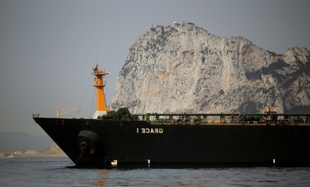 FILE PHOTO: Iranian oil tanker Grace 1 sits anchored after it was seized earlier this month by British Royal Marines off the coast of the British Mediterranean territory on suspicion of violating sanctions against Syria, in the Strait of Gibraltar, southe